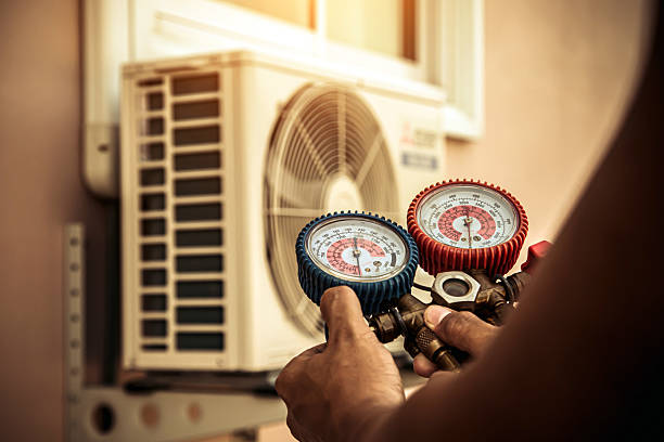 Professional Heat Pump Repair technician working in Cambridge, OH